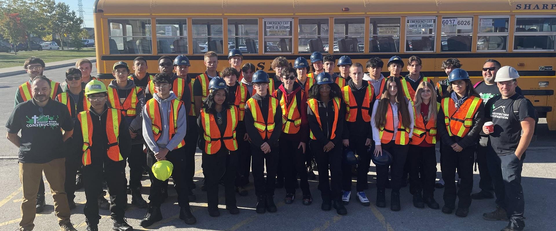 Students in front of bus